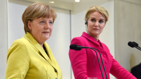 Merkel calls for EU to share refugee load