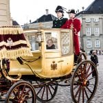 See Denmark’s queen take her annual gold carriage ride through Copenhagen