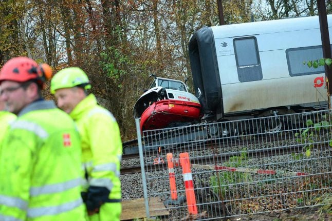 Several taken to hospital after Danish train collides with digger