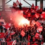 Danish cup final stopped after fans break virus rules