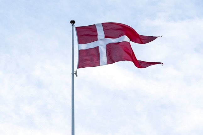 Denmark's flag Dannebrog flying in Copenhagen. The country's citizenship test has been expanded to include questions about national values.