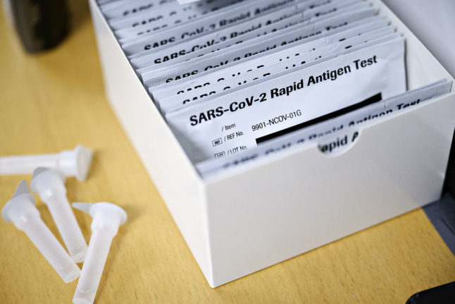 Covid-19 rapid antigen tests in Denmark. Experts say it may be beneficial for the country to reintroduce health pass and facemask rules with infection rates up.