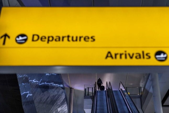 A passenger at Terminal 2 of London Heathrow Airport.